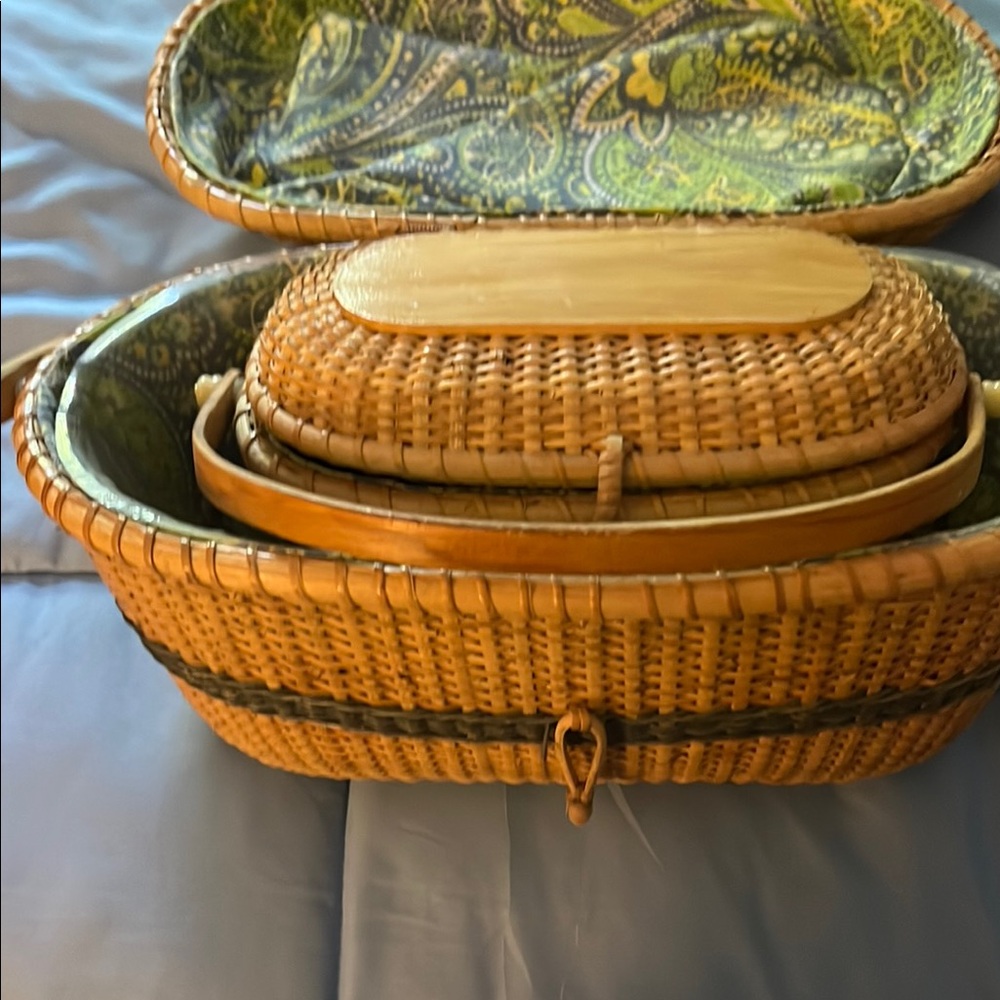 A large and a small Lone Berger Woven Basket with Lid